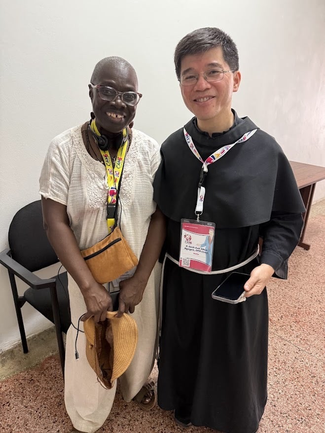 CAM6-Nguyen Antoinette Mensah, PhD., at CAM6 with Fr. Dinh Anh Nhue Nguyen, OFMConv., Secretary General of the Pontifical Missionary Union