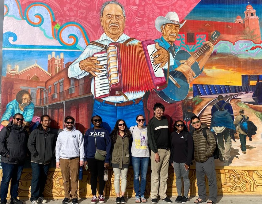 Missionary Members in Front of Mural on Mexico USA border Missionary Members in Front of Mural on Mexico USA border
